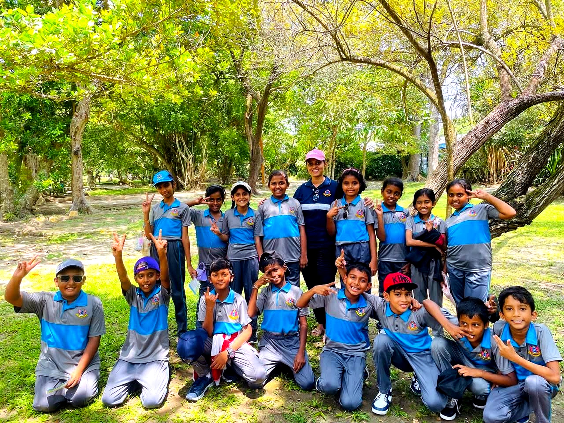 Students on outdoor field trip with teacher