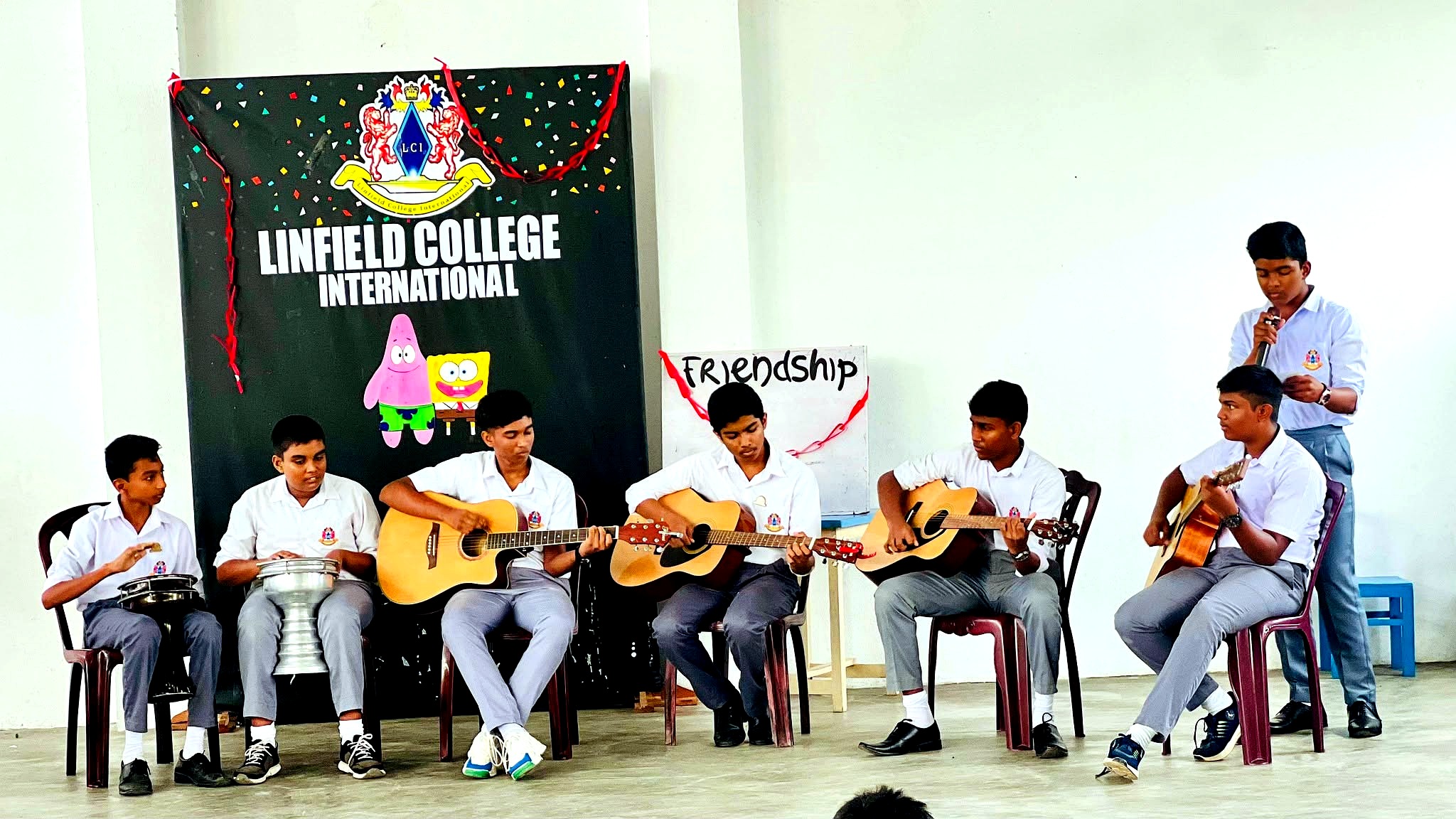 Students performing music at school event